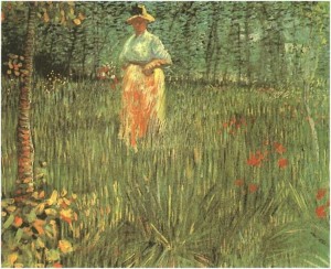 A Woman Walking in a Garden